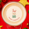 Load image into Gallery viewer, Ho Ho Ho Christmas edible drink toppers on a festive cocktail, perfect for holiday celebrations.
