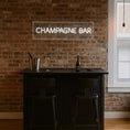 Load image into Gallery viewer, Champagne bar neon sign pre-order displayed above a stylish home bar setup.