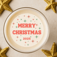 Load image into Gallery viewer, Merry Christmas edible drink toppers on a festive cocktail for 2025 surrounded by gold stars.