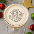 Load image into Gallery viewer, Santa's Nice List Christmas edible drink toppers on a festive cocktail with decorations.
