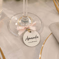 Load image into Gallery viewer, Personalised name wine glass charms with a name tag and pink bow on a wine glass.