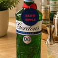 Load image into Gallery viewer, Personalised Father’s Day Text & Message Bottle Charm Gift Tag on a bottle of Gordon's Alcohol Free with a red ribbon.