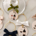 Load image into Gallery viewer, Wine Time Glass Charms Set Of 6 featuring colorful ribbon bows and unique wine-themed designs.