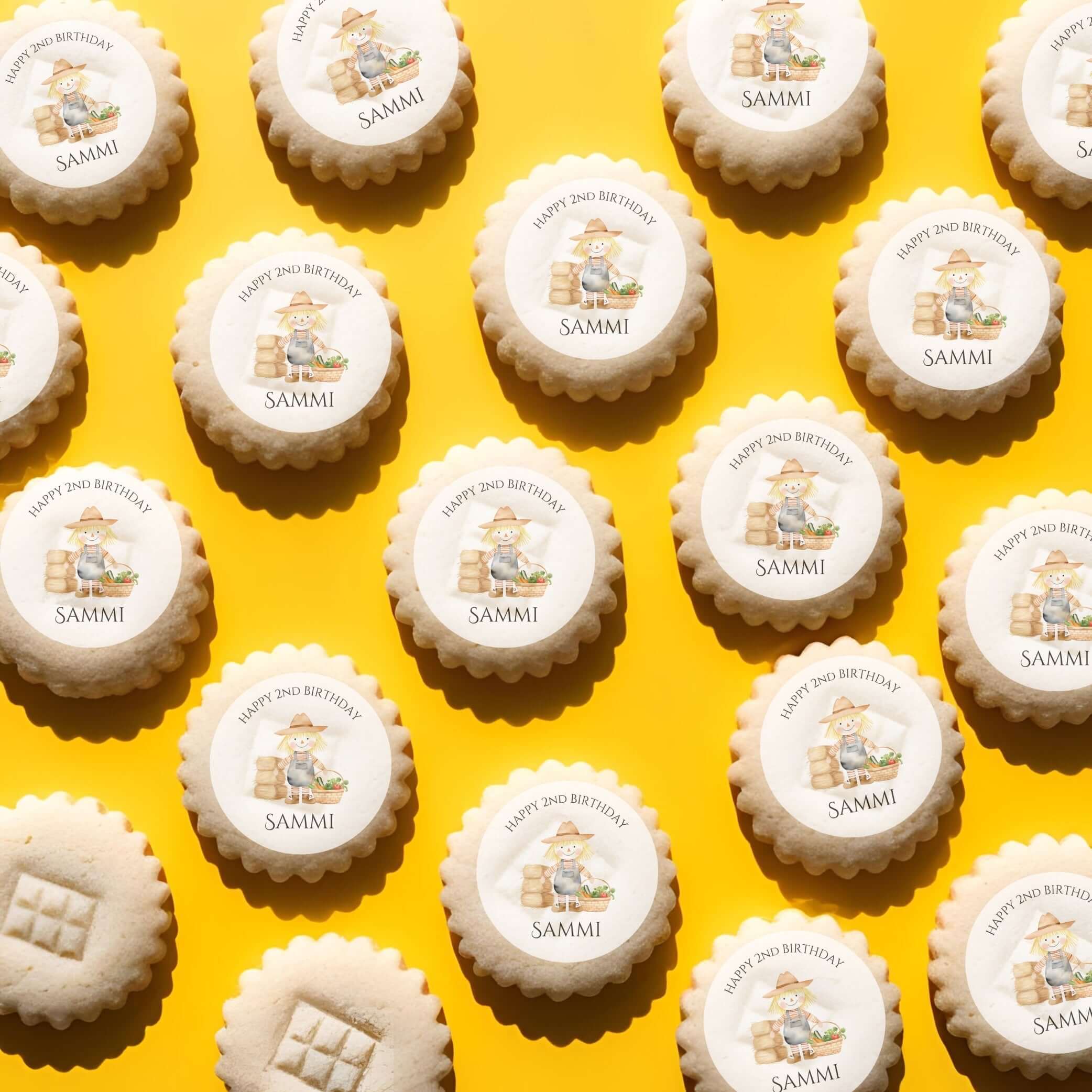 Edible cake toppers on the farm featuring personalized cookies for a child's birthday party.