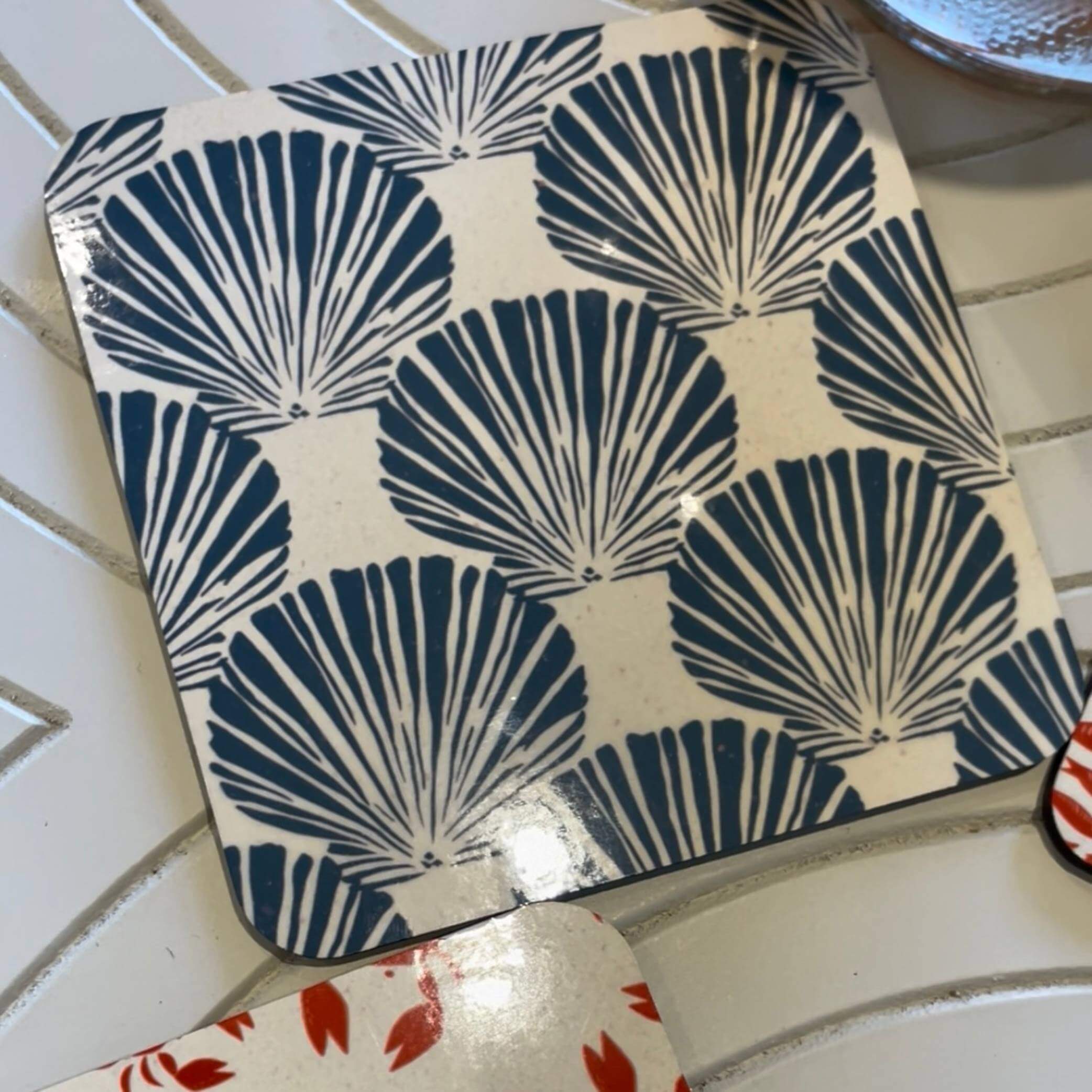 Salty Days - coastal drink coasters set of 4 featuring blue shell designs on a white background.