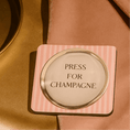 Load image into Gallery viewer, Press for champagne drink coaster on a table, featuring a humorous design with a pink striped border.
