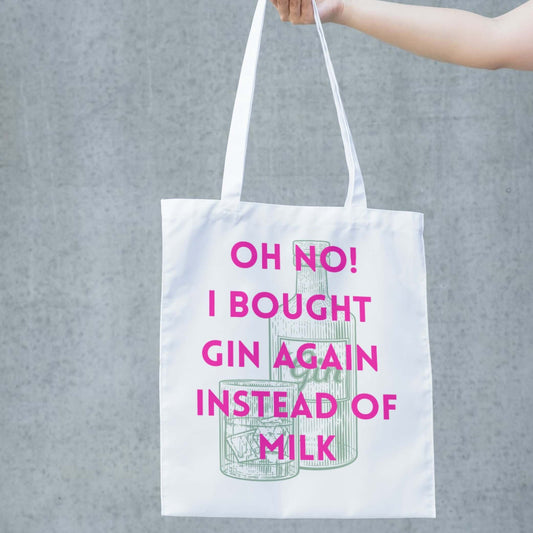 Funny gin tote bag with playful text "Oh no! I bought gin again instead of milk" on a white background.
