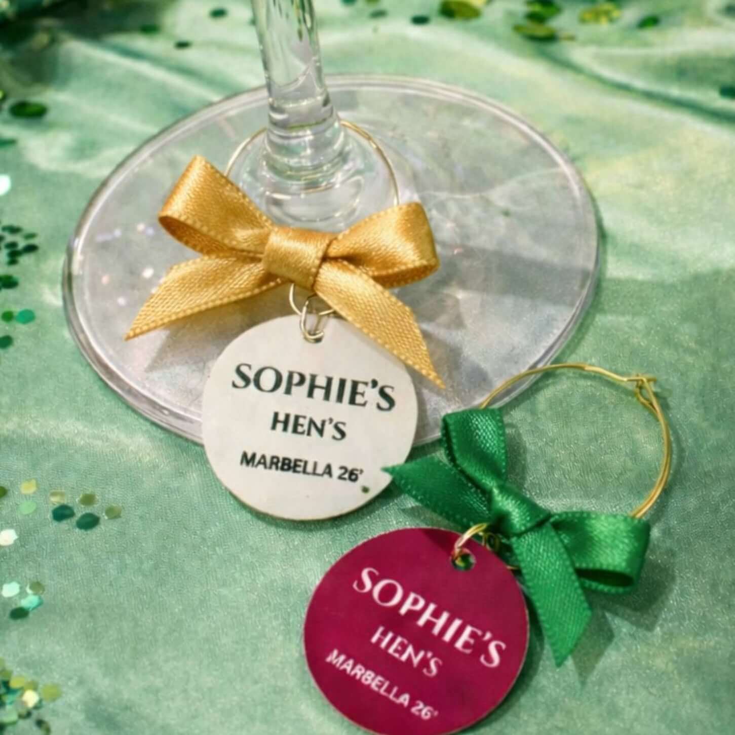 White and gold wine charms