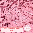Load image into Gallery viewer, Pack of 50 pink mini wooden pegs clip for drink toppers and event styling.
