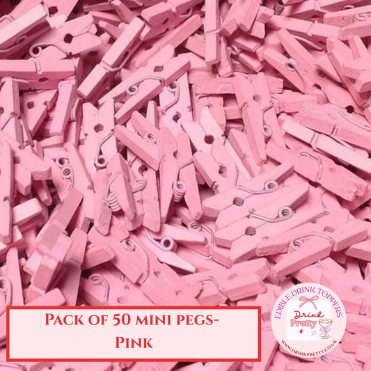 Pack of 50 pink mini wooden pegs clip for drink toppers and event styling.