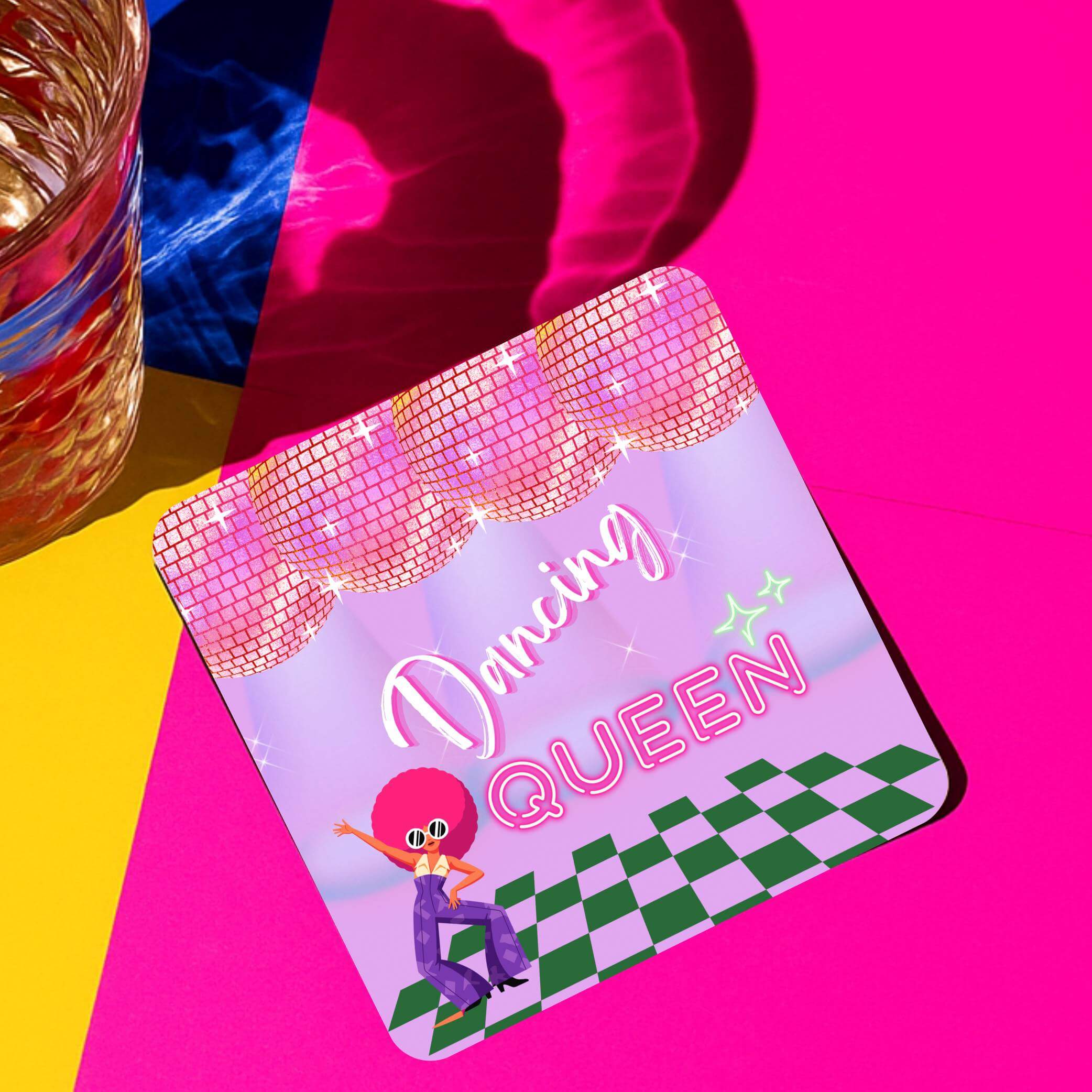 Dancing Queen drink coaster featuring vibrant colors, disco balls, and a fun cartoon character ready for a party.