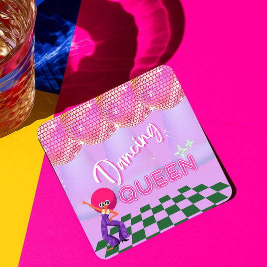 Dancing Queen drink coaster featuring vibrant colors, disco balls, and a fun cartoon character ready for a party.
