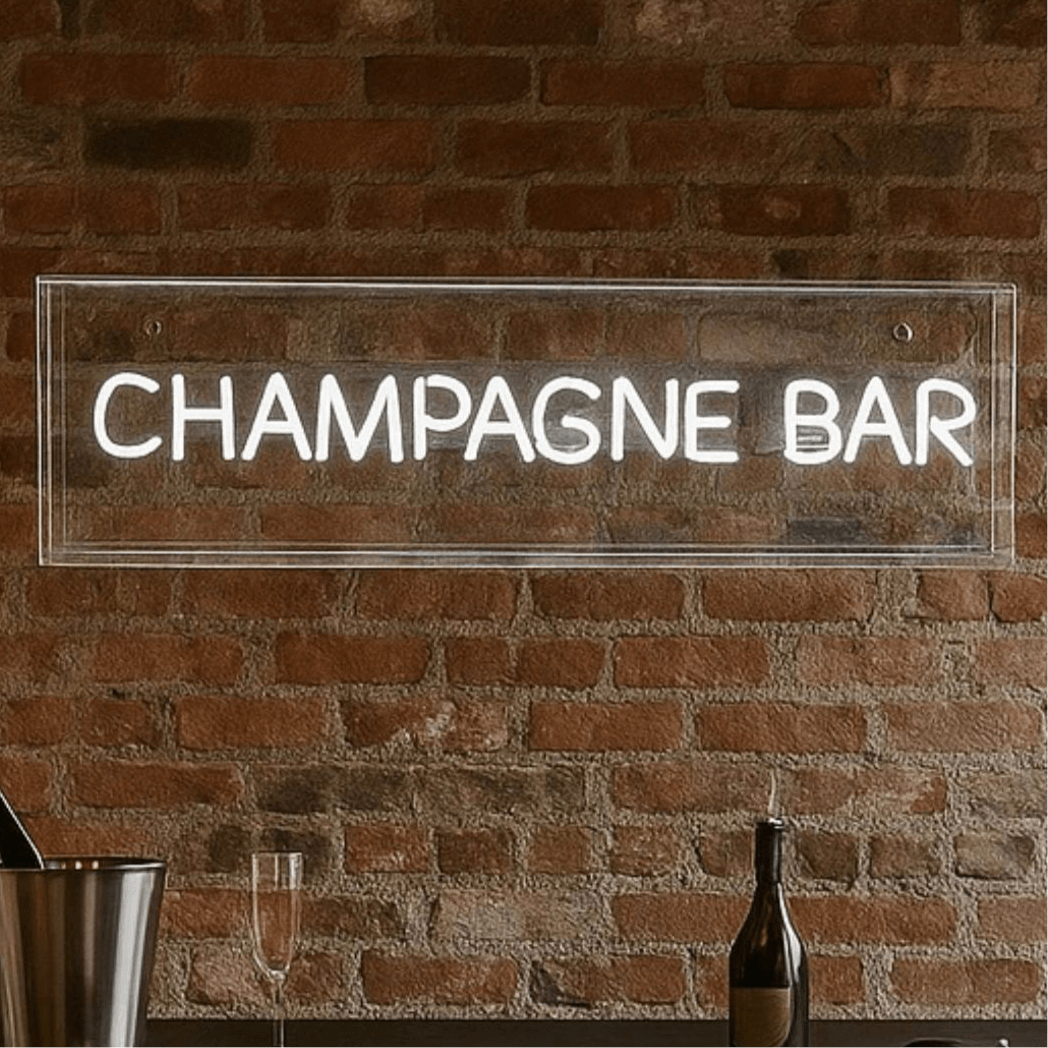 Champagne bar neon sign pre-order displayed on a brick wall, perfect for celebrations and home bars.
