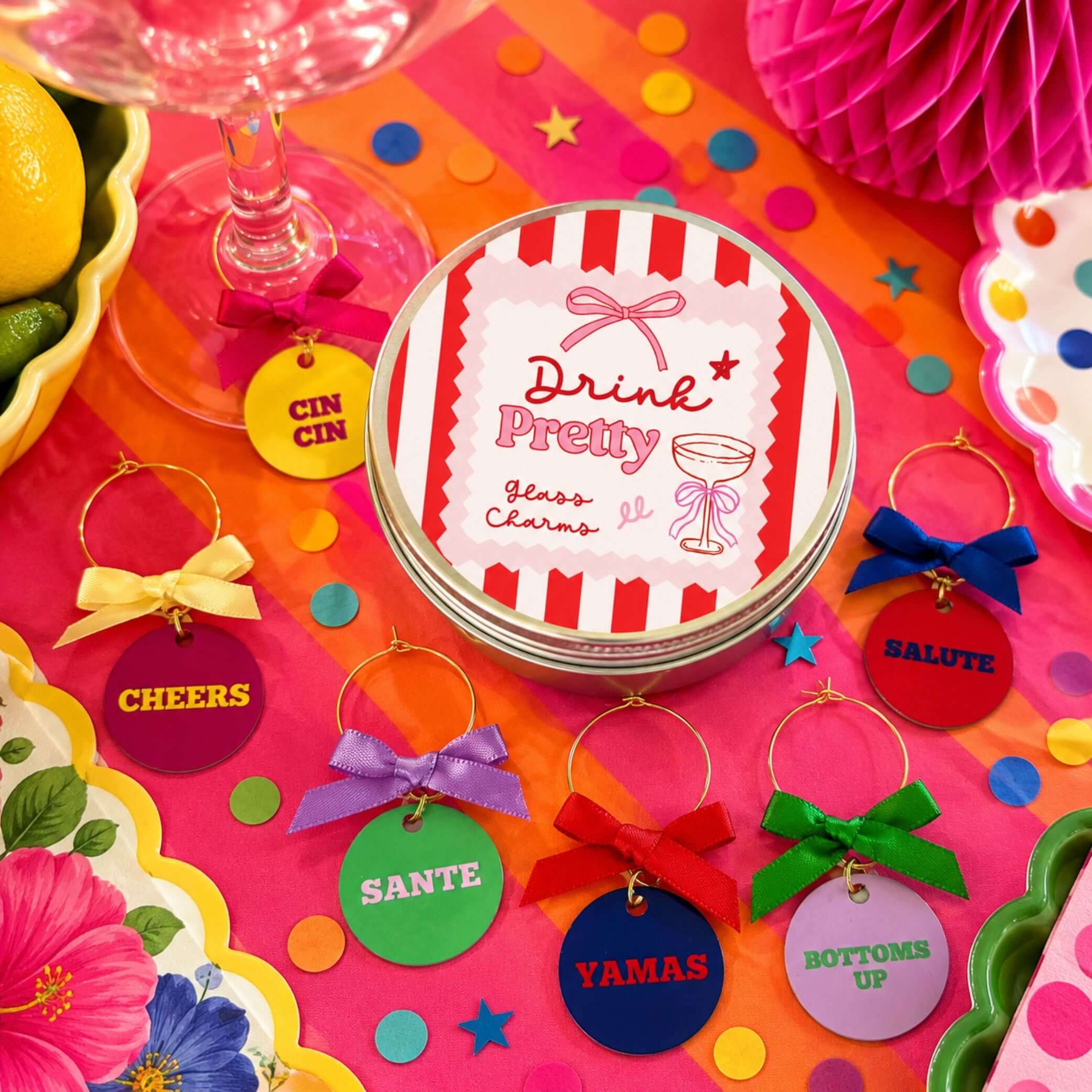 Lets Toast Wine Glass Charm Set of 6 featuring colorful charms and a decorative tin with the text Drink Pretty.