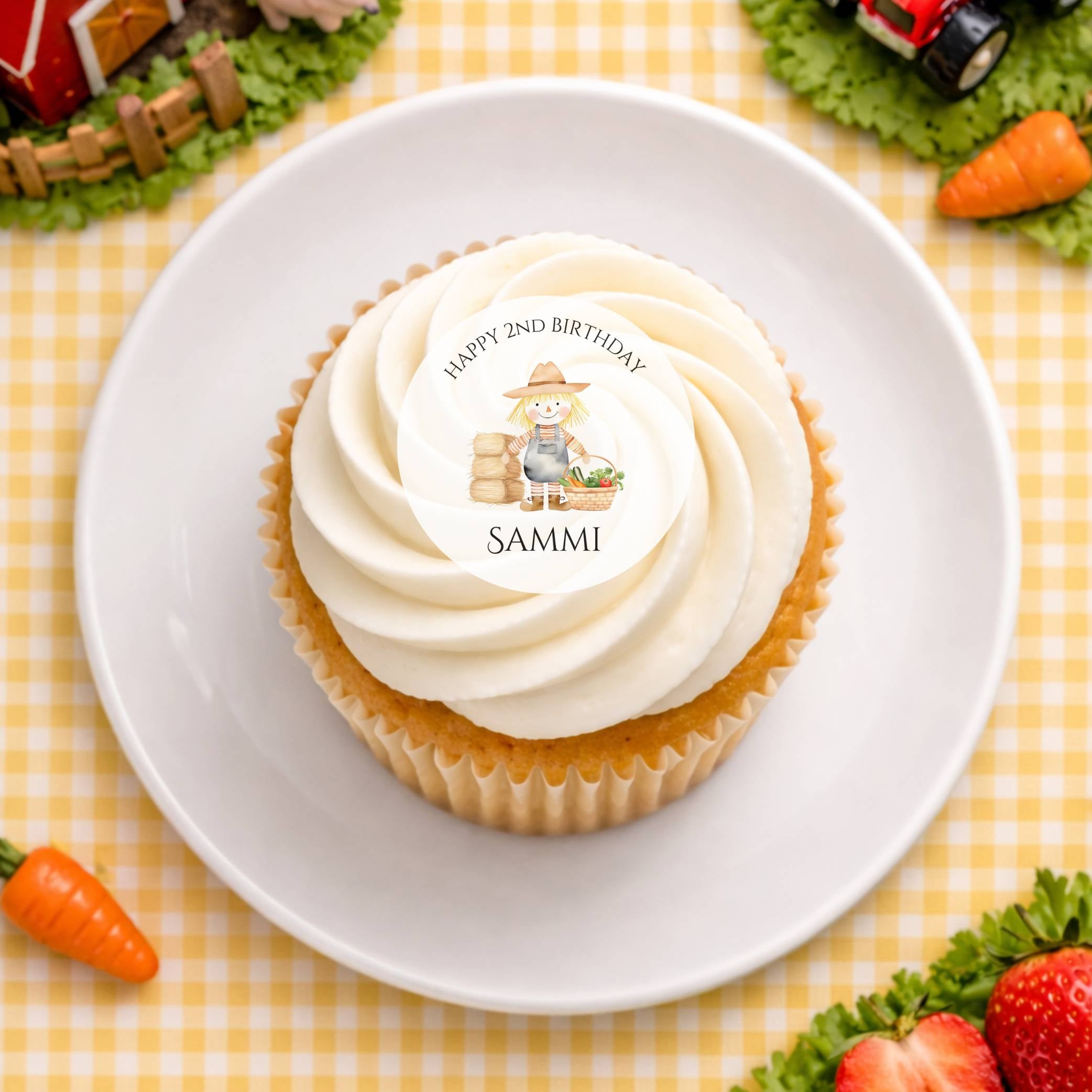 Edible cake toppers on the farm featuring a cute scarecrow design on a birthday cupcake.