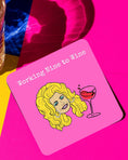 Load image into Gallery viewer, Working Nine To Wine Drink Coaster featuring a cartoon character with a wine glass on a bright background.
