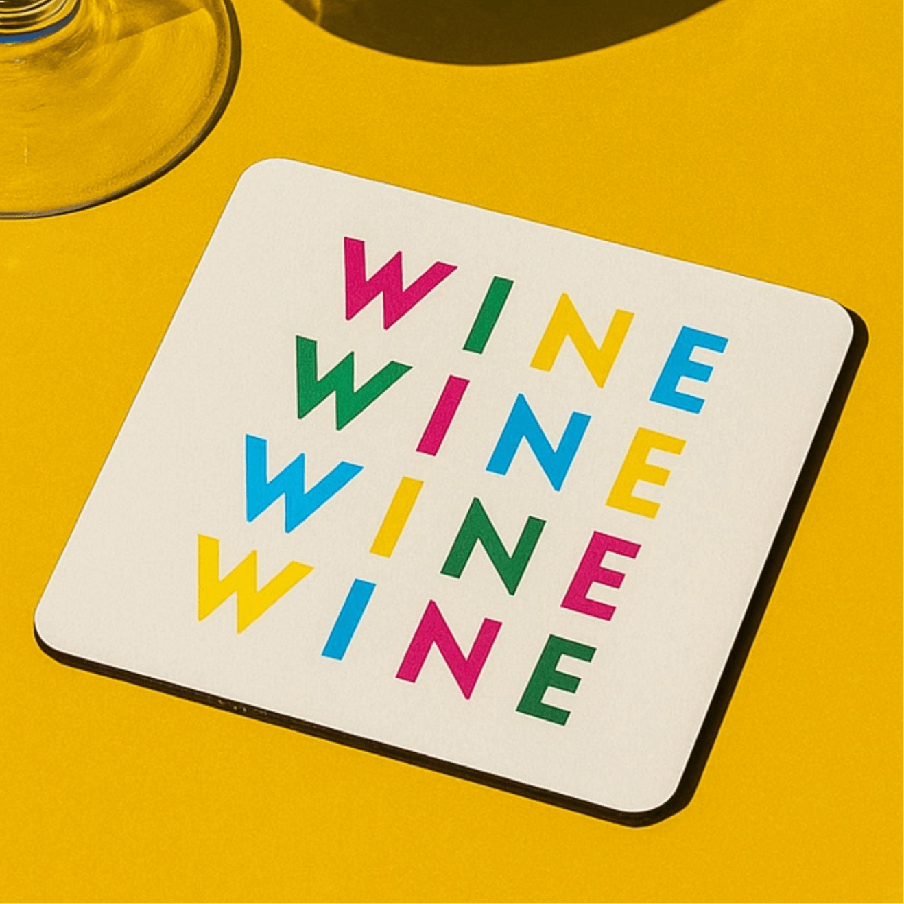 fun wine drink coaster featuring colorful design with the word 'WINE' in bold letters on a yellow background