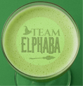 Load image into Gallery viewer, Green frothy drink with 'Team Elphaba' text, perfect for Wicked themed cocktails.
