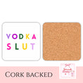 Load image into Gallery viewer, Vodka Slut Drink Coaster with colorful text on white surface and cork backing, perfect for adding humor to drinks.
