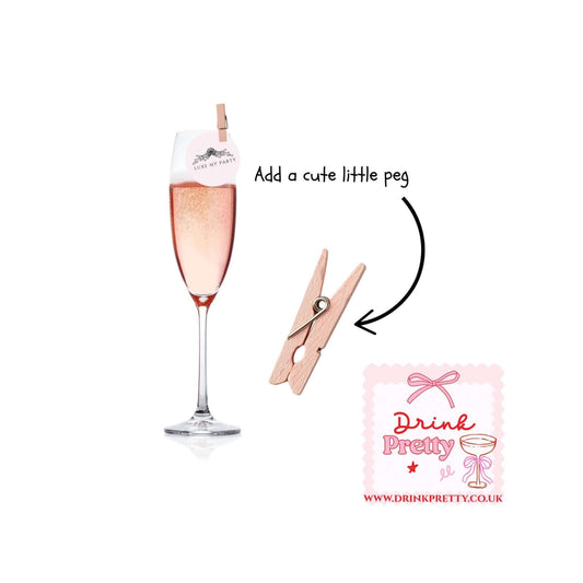 Sparkling drink with a personalized tag and a cute peg for decoration, perfect for special occasions.