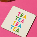 Load image into Gallery viewer, Tea themed drink coaster displayed on a vibrant pink background with colorful 'TEA' text design.
