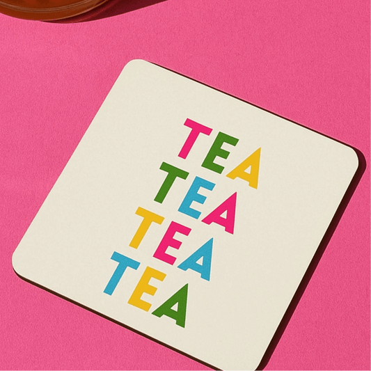 Tea themed drink coaster displayed on a vibrant pink background with colorful 'TEA' text design.