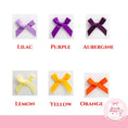 Load image into Gallery viewer, Personalised wine charms in various colors: lilac, purple, aubergine, lemon, yellow, and orange satin bows.
