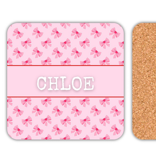 Personalised name coasters featuring pink ribbon bow design and name CHLOE.