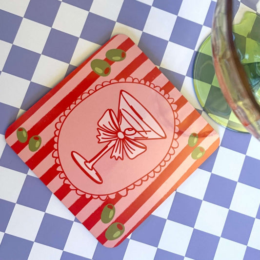 Cocktail Time Drink Coaster featuring a vibrant martini glass design with olives on a striped background.